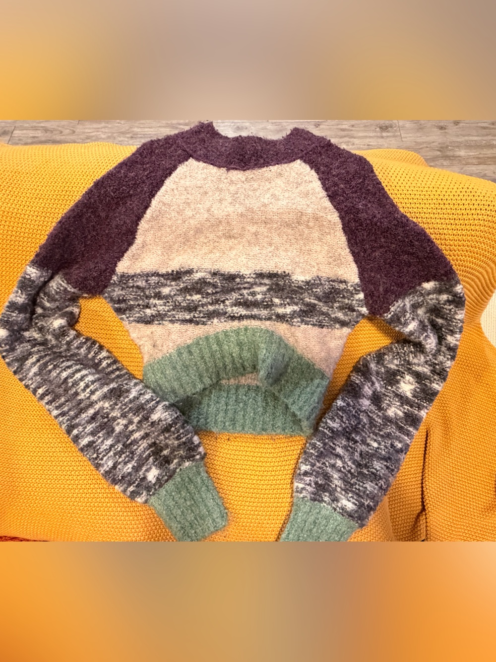 Urban Outfitters multi-colored sweater with marled gray and white sleeves